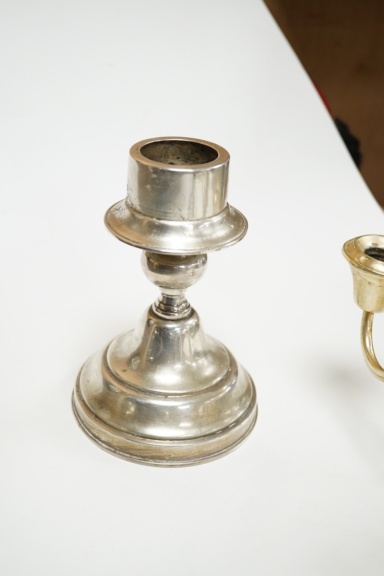 A pair of continental 800 standard white metal candlesticks, 15.5cm, 11.5oz, together with a Frank M. Whiting & Company sterling two branch, three light dwarf candelabrum, 15cm, weighted.